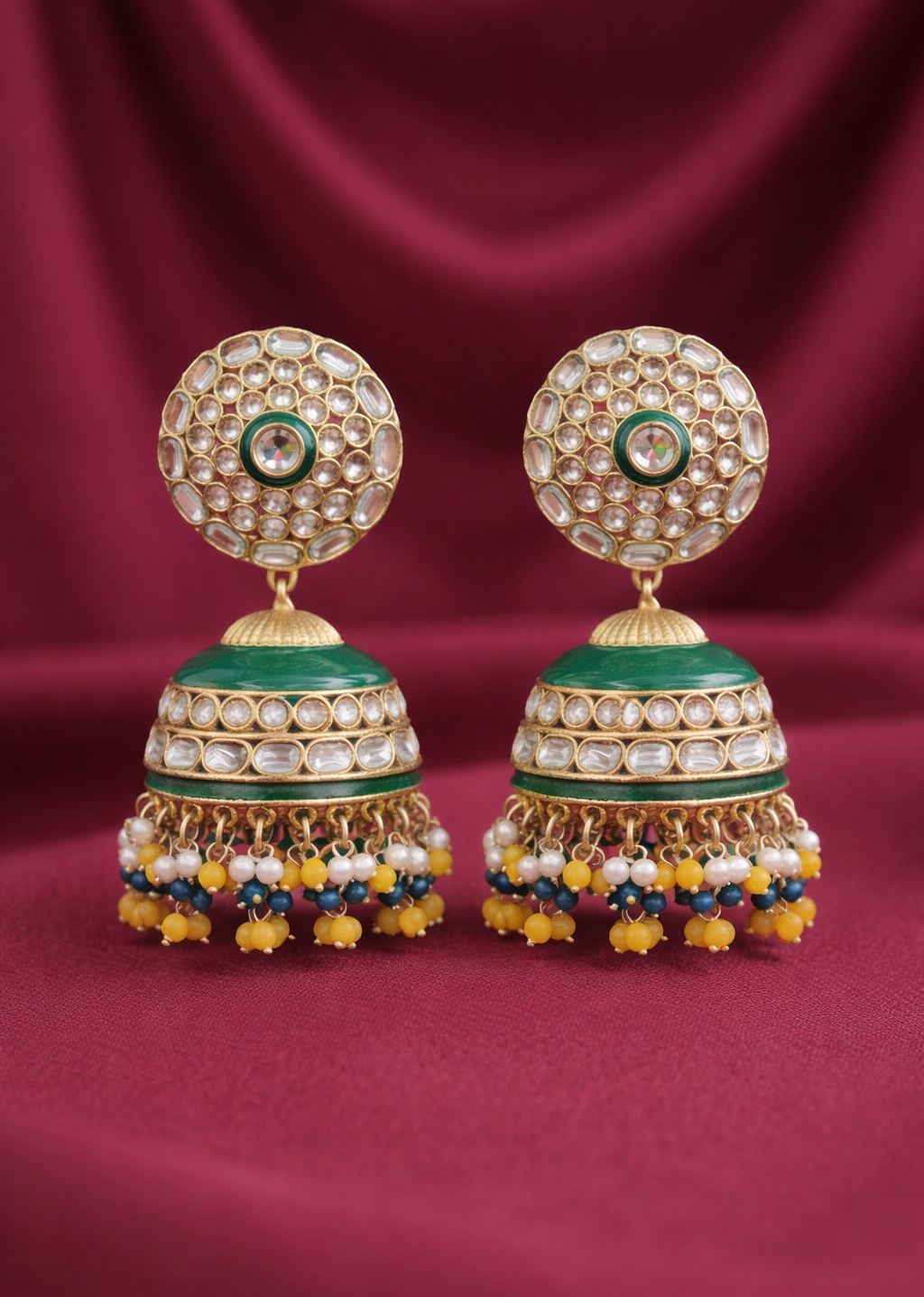 Regal Kundan Jhumka Earrings with Emerald Enamel & Pearl Drops - Yellow