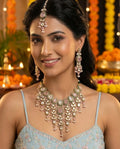 The Maharani’s Garden - Blush Pink Kundan Floral Bib Necklace Set with Pearl Accents